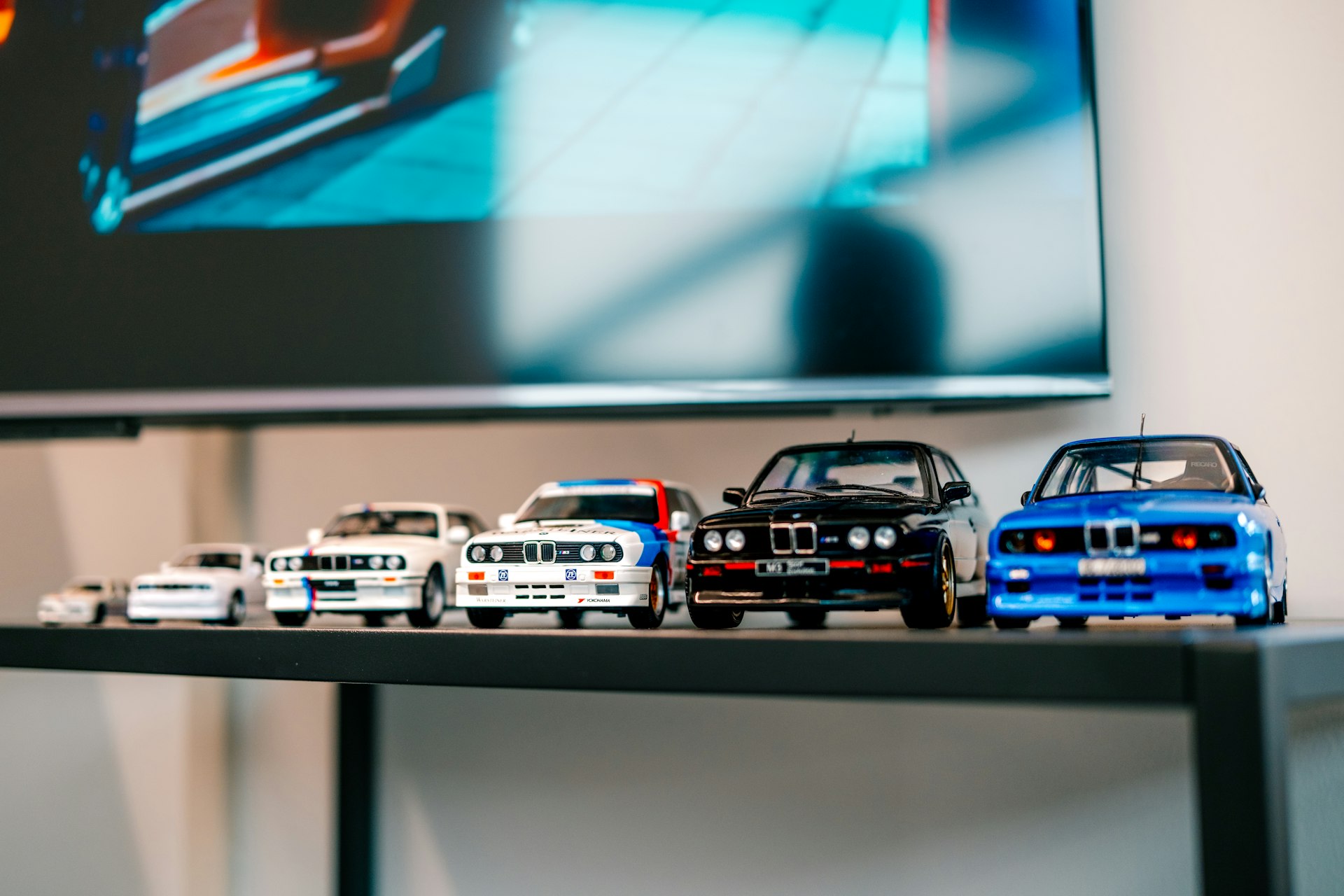 A group of toy cars sitting on top of a table